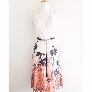 Akiko silk cream sleeveless wrap dress in Medium